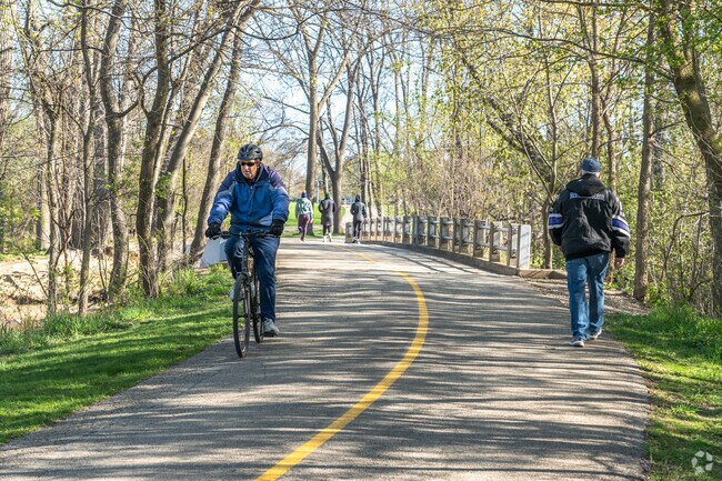 Bikers, runners and walkers all share the same trail at Caldwell Woods in Niles.
