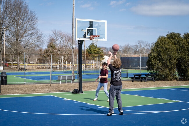 Family and friends can have fun while enjoying a basketball game at Wilson Park in Hamilton, RI.