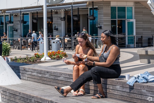 Friends enjoy ice cream on the Vancouver Waterfront in Lincoln.