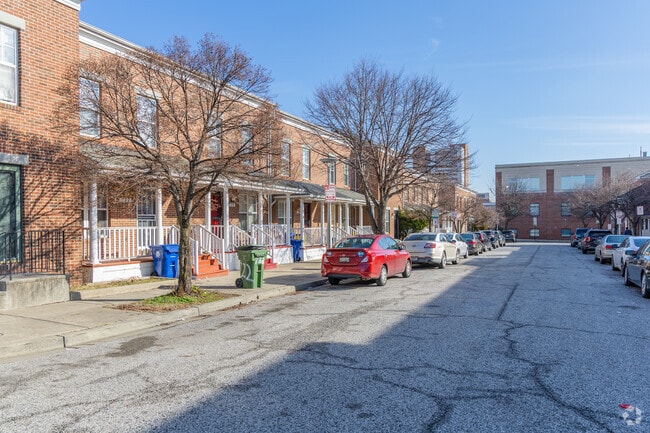 There are many Brick Row Houses with tree lined streets in Lexington Terrace.