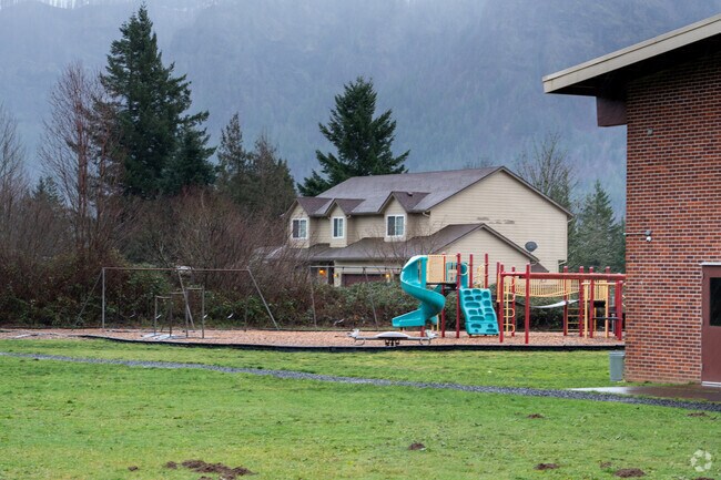 Skamania Elementary School features a diverse playground behind the school.