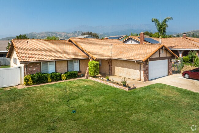 Single-story home with brick trim located in a Calimesa neighborhood.