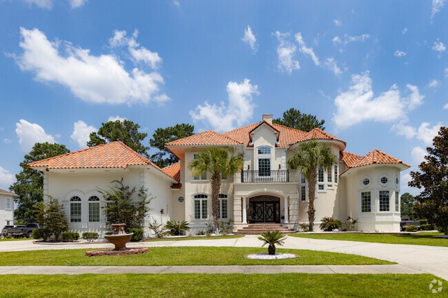 Spanish tile roofs and light stucco exteriors are some architectural features found in Pooler.