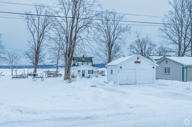 You'll find most, if not all, North Harmony lakefront homes have a driveway, garage, and ample space from neighbors.