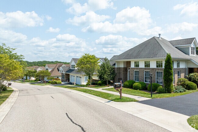 Single-family homes line Warm Hearth Village in Merrimac.