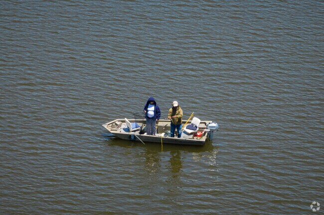 Local fisherman pulling up a catch on Lake Wohlford in Escondido.