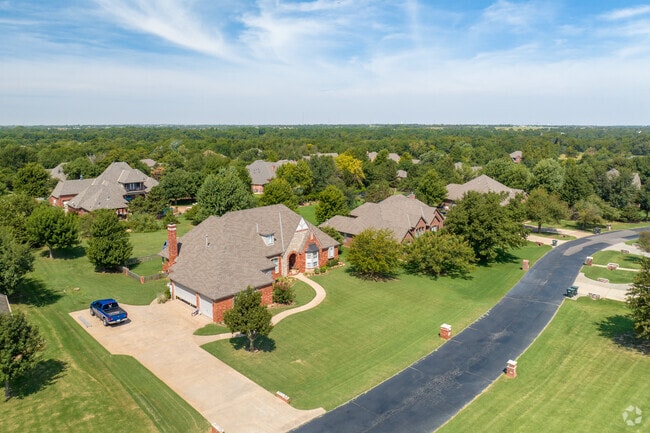 Deer Creek is filled with tall mature trees providing privacy.
