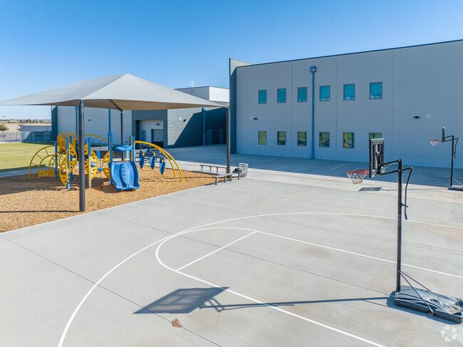 Katherine Mecham Barney Elementary students can play basketball or enjoy the playground.