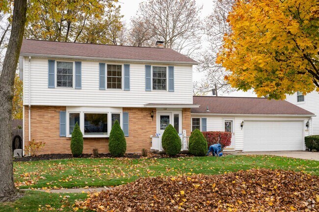 Many homes in T Edison School feature a garage and a driveway.