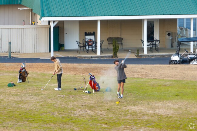 Swing by Cypress Lakes Golf Course off Cypress Lakes Road in Grays Creek.