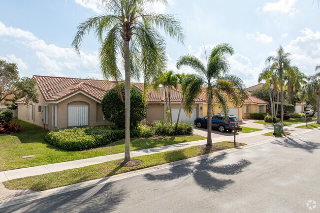 Palm trees and great landscaping are all around The Springs neighborhood.