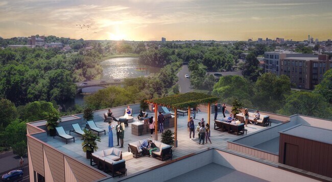 Roof top deck with views of the Charles, (2) gas grills, TV, etc