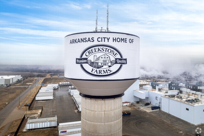 The Arkansas City water tower showcases local charm.