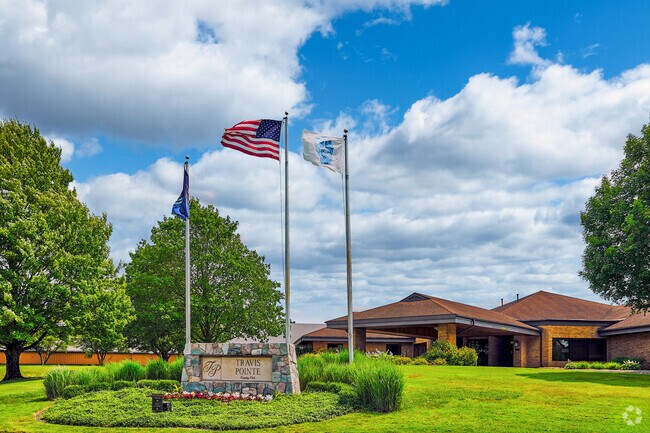 Travis Pointe Country Club offers a championship golf course and other exclusive amenities.