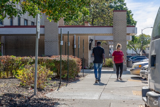 Residents stroll the sidewalks on the bustling Mount Pleasant Road in Northview Heights.