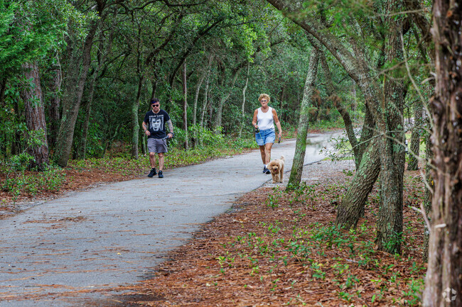 Locals love to walk with their best friend at Halyburton Park.