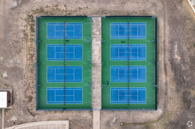 Students at Lowell Smith Jr Middle School can play sports like baseball, tennis, and football.