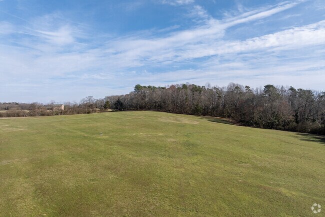 Experience the expansive green space at Hurricane Shoals Park, where you can relax amidst vibrant nature or have a delightful picnic surrounded by the sights and sounds of the great outdoors.