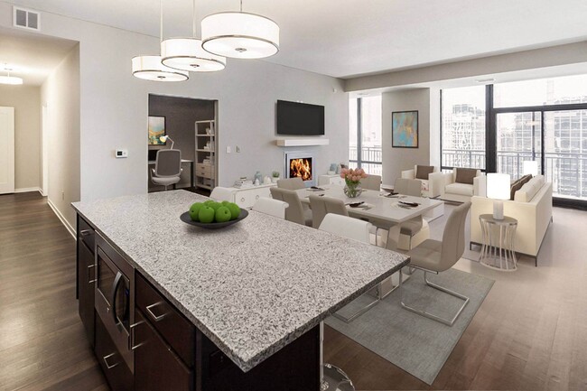 Nic on 5th Apartments in Minneapolis, Minnesota- large living room with wooden floors and views of Downtown West Minneapolis