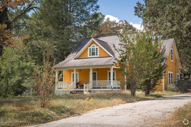 Cottages adorn wooded hills in Hinkles.