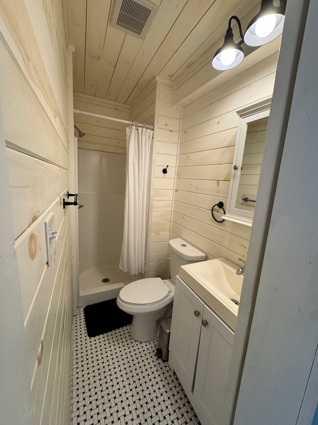 Bathroom with sliding barn door