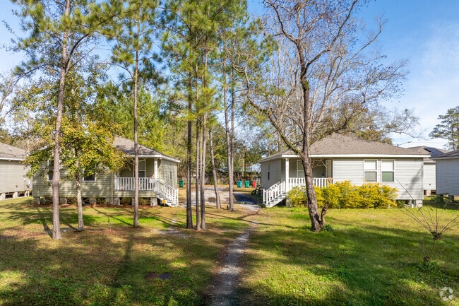 A shotgun double in Covington’s West 30s preserves classic architecture.