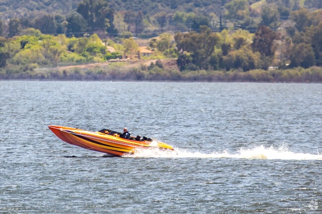 In Lake Elsinore's Lake View District, the boating lifestyle is vibrant, with residents and visitors enjoying activities like wakeboarding, water skiing, and jet skiing on the expansive 3,000-acre lake.