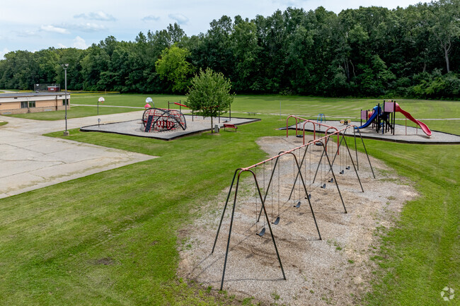 A row of swings can be found for students behind Townsend Elementary School.