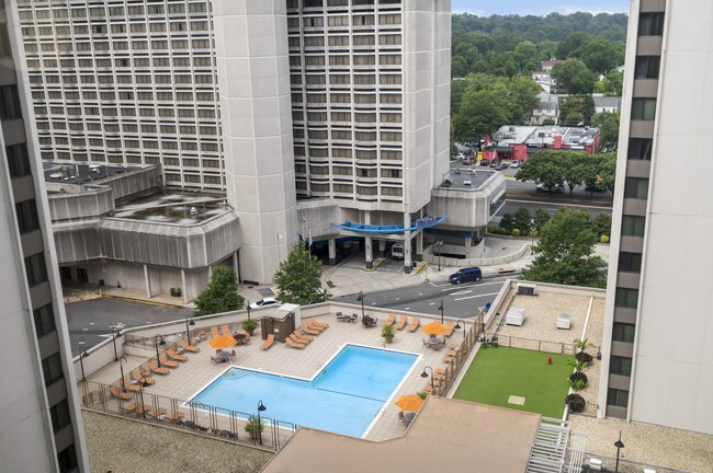 Sparkling Pool with Expansive Sundeck and Tanning Areas