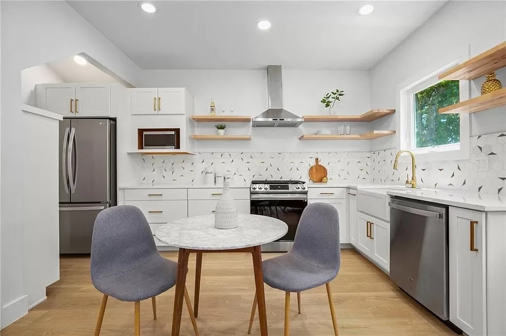 Modern and unique kitchen that has been newly renovated.