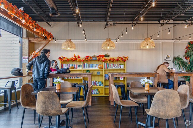 Enjoy a cup of coffee in the cozy interior of Euforia Cafe in Pine Trails Estates.