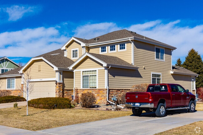 Contemporary duplexes can be found in the center of Grant Ranch by the lakes.