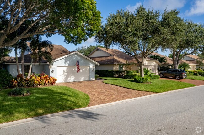 Many residential streets offer a sidewalk and are lined with trees in the Bluffs neighborhood.