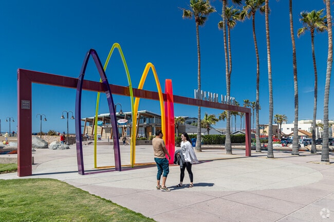 Imperial Beach Pier is accessed through some surf inspired artwork.