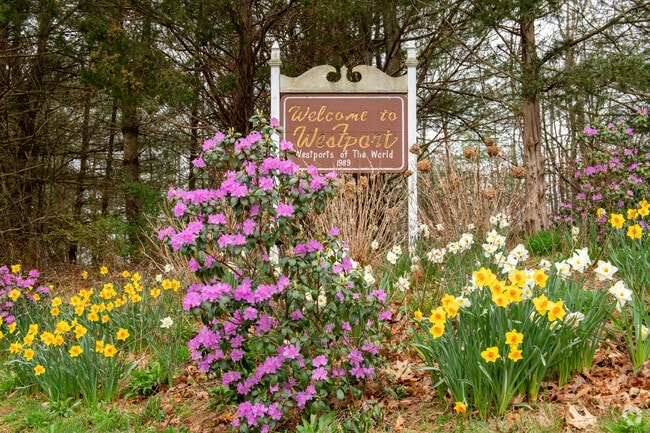 Residents and visitors are welcomed to Westport with blossoming flowers.