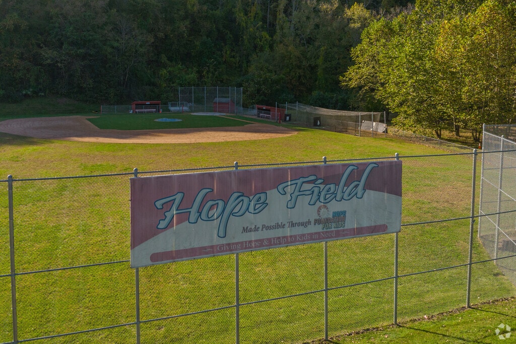 Students play baseball on Hope Field at Faith Prep School in Lanesville.