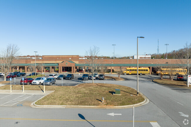 Flowery Branch High School has a 17 to 1 student teacher ratio.