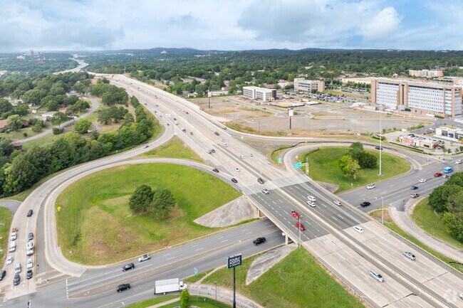 Interstate 630 runs along the northern border of Oak Forest.