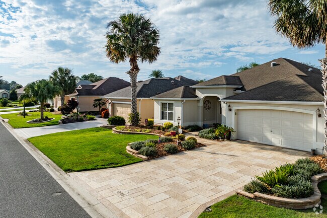 The Village of Largo features well maintained landscaping and mature palm trees.