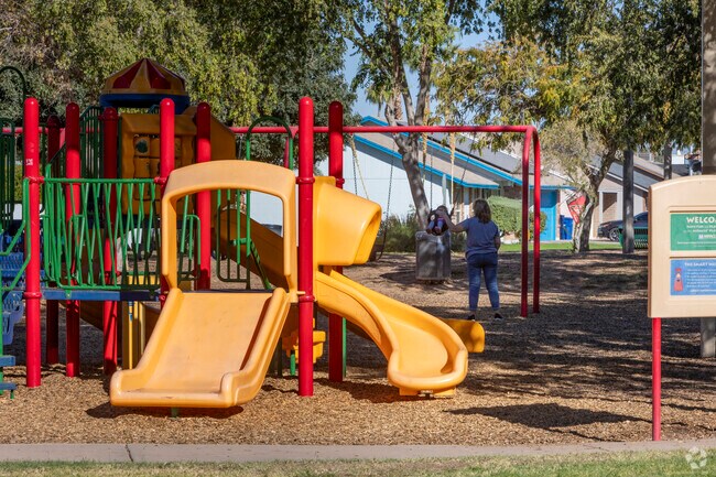 Chandler’s Brooks Crossing Park has a playground covered by many shade trees.