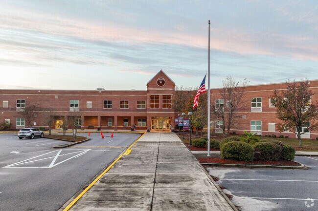 White Knoll Middle School is awake and active at sunrise.