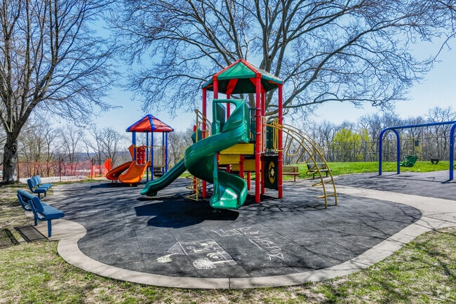 Children enjoy the playground at Officer Eric Kelly Memorial Field.