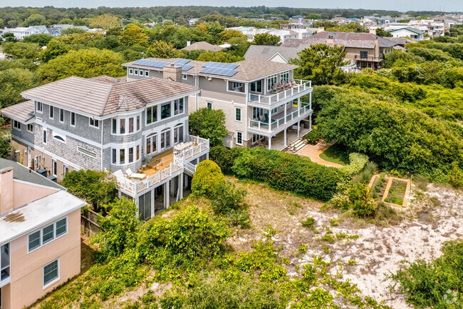 Homes line up along the shore in the North End neighborhood of Virginia Beach.