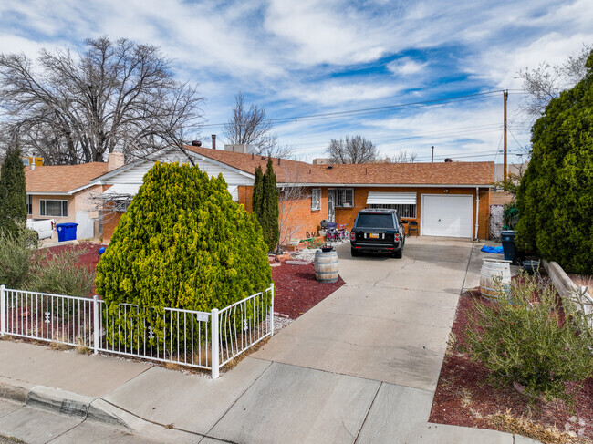 Experience the charm of single family homes lined up along a street in Hodgin, NM.