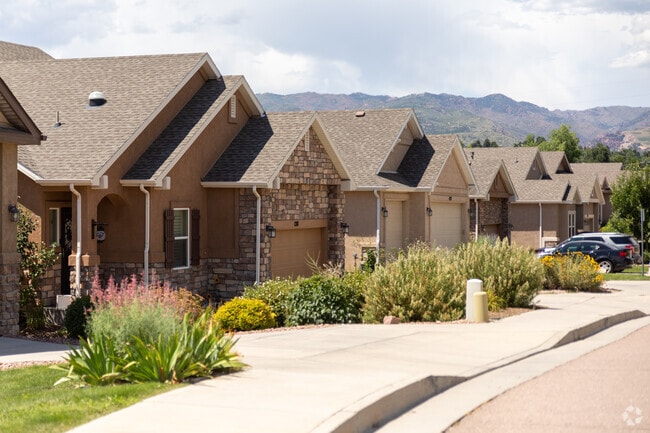 Newer homes in Garden of the Gods feature multi-car garages and curated landscaping.