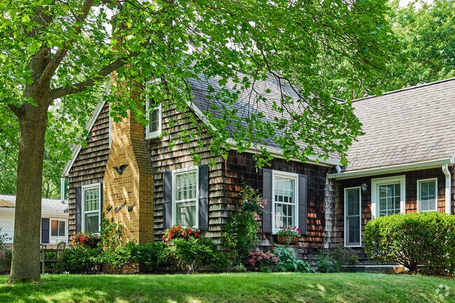 Elegant wood-shingle siding makes this Allmendinger cottage stand out from the rest.