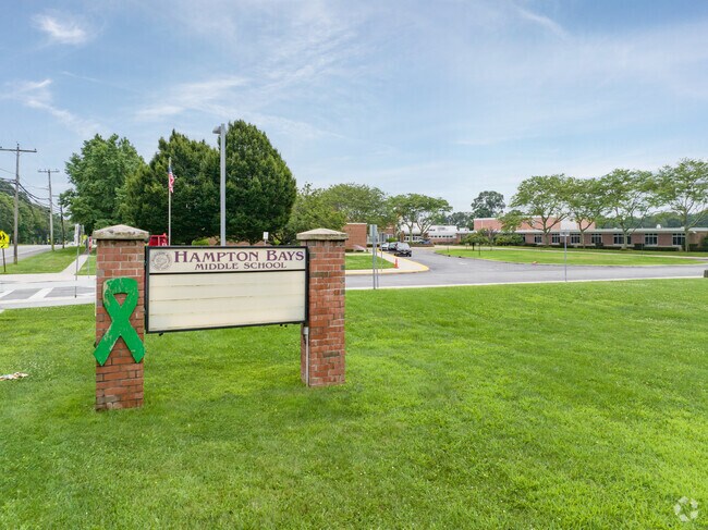 Hampton Bays Middle School's pylon sign displays important announcements.