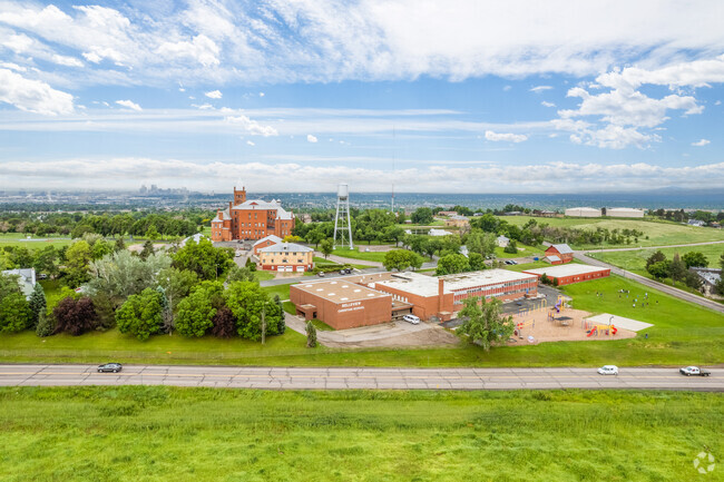 Context view showing the buildings at Belleview Christian School in Westminster, Colorado