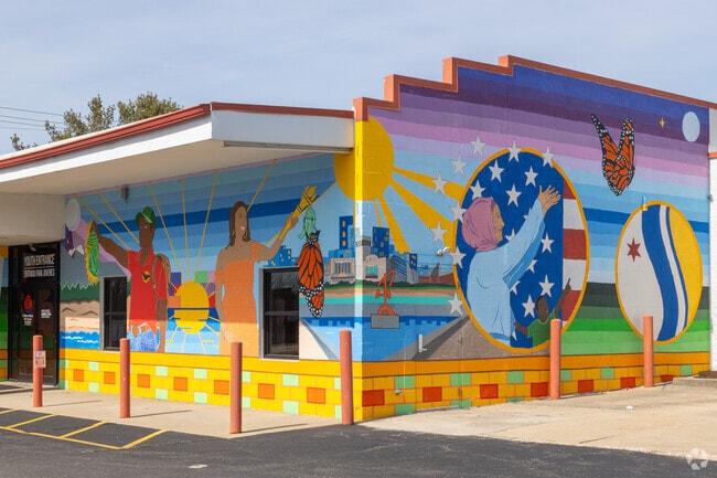 Rum Village has lots of colorful building art and murals for locals and visitors to enjoy.