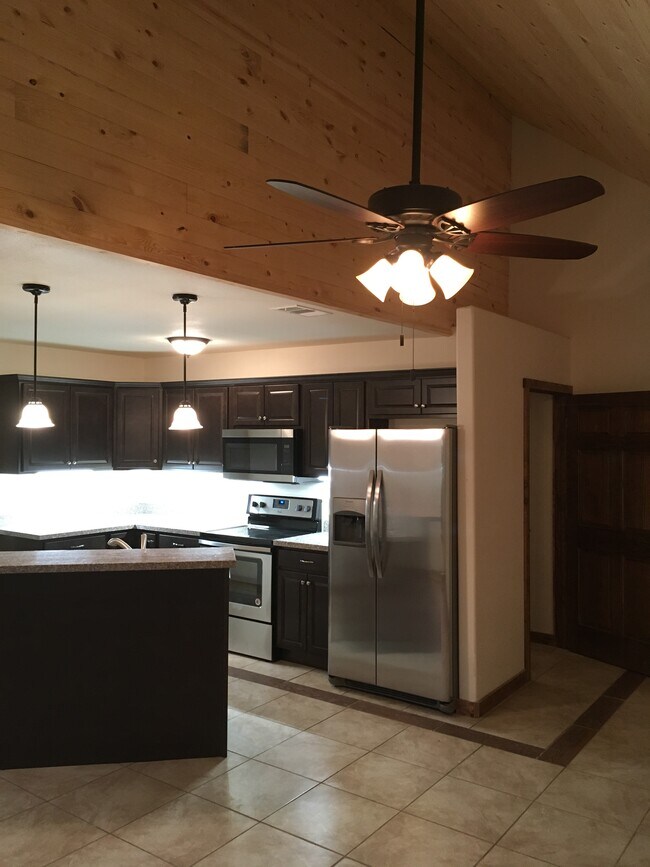 nearly new stainless fridge, stove, dishwasher